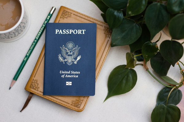 Passport, concert itinerary, and insurance documents organized for a European student music trip with Music Contact International.